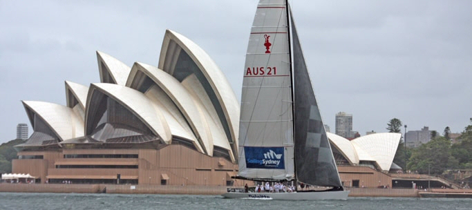 americas cup sailing past opera house sydney harbour