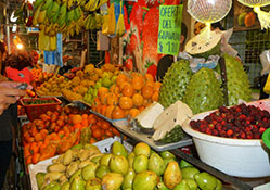 fruit stand in Colombia with spiky guanabana